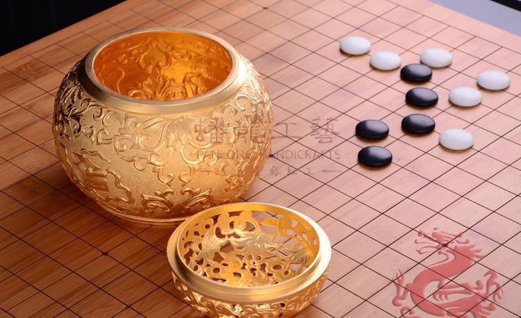 银辉映棋趣 大洋金银制品厂蟠龙工艺围棋罐的文化韵味